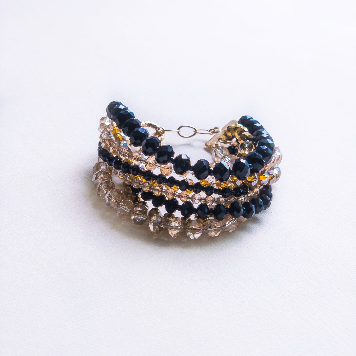 Pulsera Eight In One Negra y Dorada