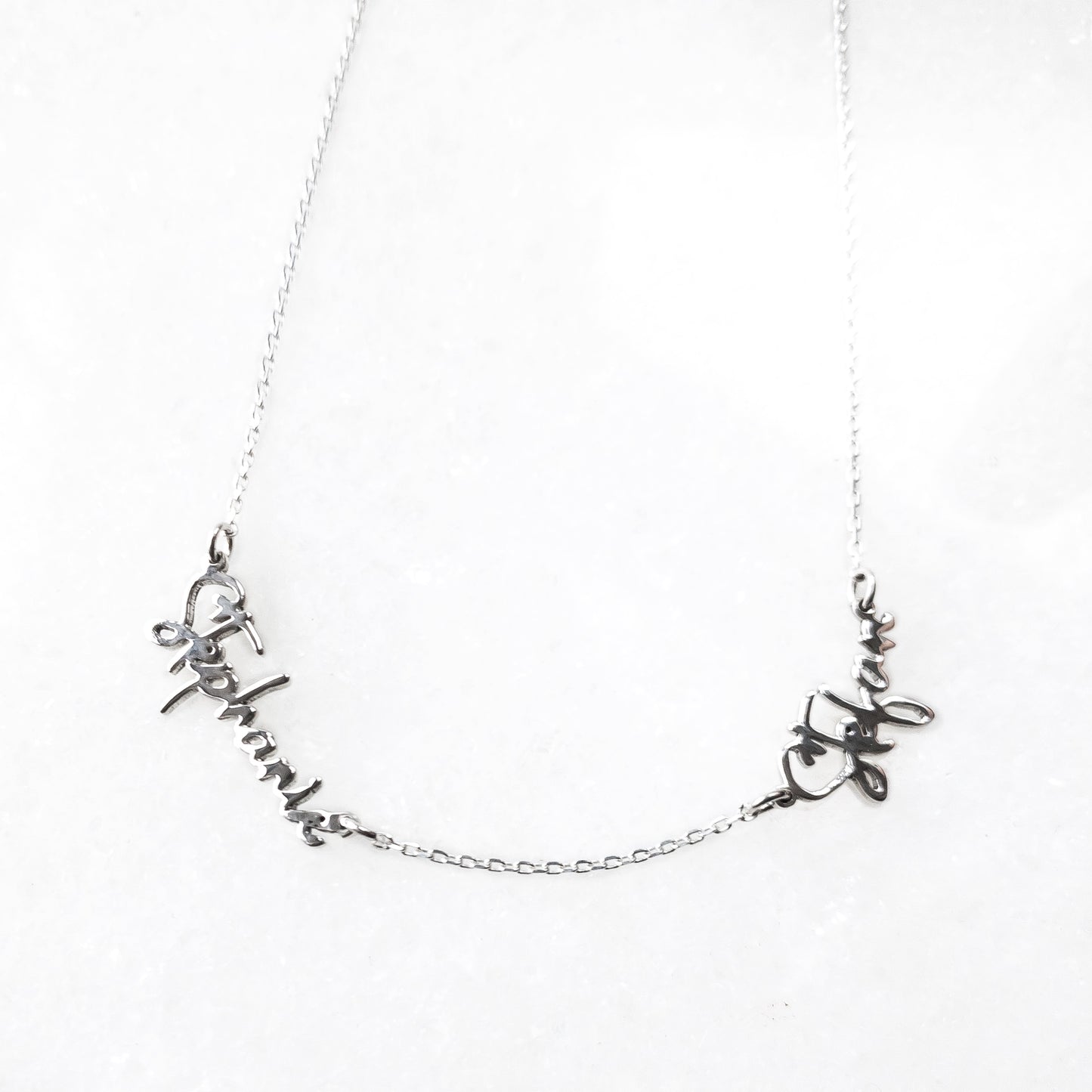 Collar con dos nombres