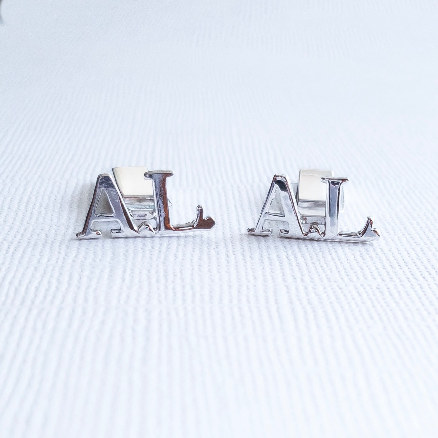 Gemelos con inicial personalizada