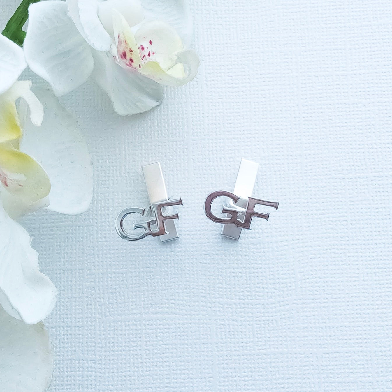 Gemelos con inicial personalizada