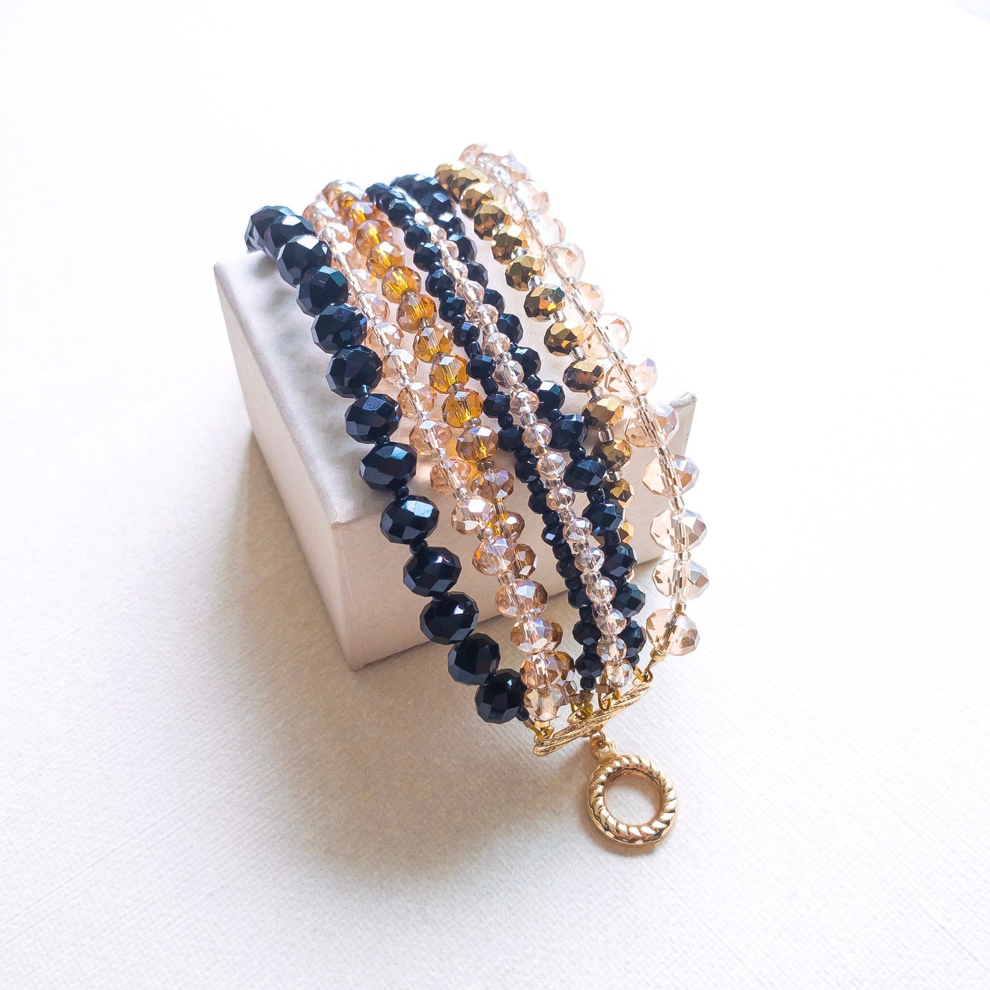 Pulsera Eight In One Negra y Dorada