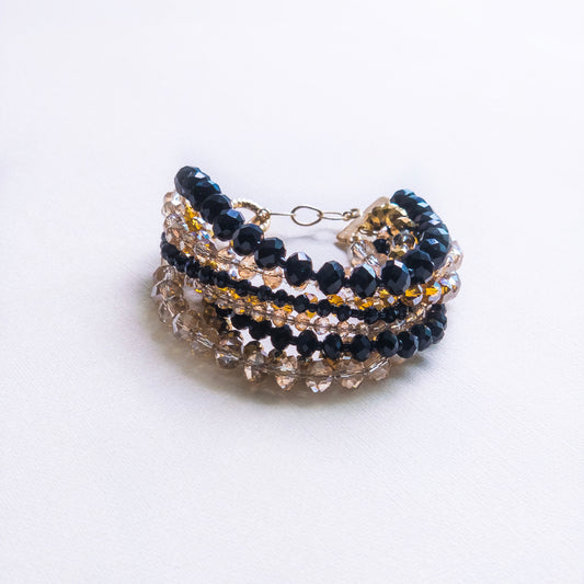 Eight In One Black and Gold Bracelet